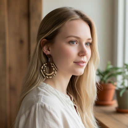 Trulyolive handmade wooden hoop earrings with brown leather accent and striped pattern. Lightweight and unique.